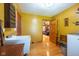 Laundry room featuring a large white sink and doorway to the living room at 2221 W County Road 500 N, Danville, IN 46122