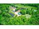 Expansive property featuring lush forests, ponds, and well-maintained outbuildings at 2240 Bill Smith Rd, Martinsville, IN 46151