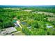 Expansive property featuring lush greenery, multiple buildings, and a serene pond at 2240 Bill Smith Rd, Martinsville, IN 46151