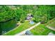 Aerial view featuring a charming home with a pool and beautiful green landscaping at 2240 Bill Smith Rd, Martinsville, IN 46151