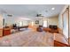 Expansive finished basement with a pool table, a seating area, and natural light from multiple windows at 2240 Bill Smith Rd, Martinsville, IN 46151
