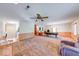 Spacious game room featuring a billiard table, ceiling fan, and half wall wood panels at 2240 Bill Smith Rd, Martinsville, IN 46151