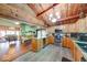 Open kitchen with wooden cabinets, an island, and modern stainless steel appliances at 2240 Bill Smith Rd, Martinsville, IN 46151