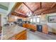 Spacious kitchen with wooden cabinets, stone countertops, and stainless steel appliances at 2240 Bill Smith Rd, Martinsville, IN 46151