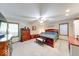 Spacious main bedroom with ceiling fan, dresser, and bed with bench, offering ample natural light at 2240 Bill Smith Rd, Martinsville, IN 46151