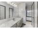 Bathroom featuring a vanity, a mirror, and a window, offering a bright and functional space at 3134 W Hickory Woods Dr, Greenfield, IN 46140