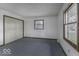Bedroom with carpet flooring, a closet, and a window, providing a cozy and private retreat at 3134 W Hickory Woods Dr, Greenfield, IN 46140
