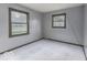 Bedroom featuring two windows, creating a bright and airy atmosphere with natural light at 3134 W Hickory Woods Dr, Greenfield, IN 46140