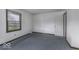 Bedroom with carpet flooring and a window, offering a simple and comfortable space at 3134 W Hickory Woods Dr, Greenfield, IN 46140