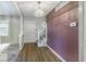 Welcoming foyer with wood floors and classic staircase, creating a charming entrance at 3134 W Hickory Woods Dr, Greenfield, IN 46140