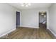 Bright living room with hardwood floors and ample natural light, perfect for relaxing or entertaining at 3134 W Hickory Woods Dr, Greenfield, IN 46140