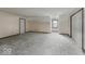 Bright living room with neutral walls and plush carpet, providing a cozy and inviting space at 3134 W Hickory Woods Dr, Greenfield, IN 46140