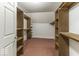 Large walk-in closet with built-in shelving, offering ample storage and organization options at 3134 W Hickory Woods Dr, Greenfield, IN 46140