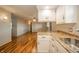 Spacious kitchen flowing into the living area, showcasing modern design at 331 W 5Th St, Lapel, IN 46051