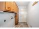 Convenient laundry area with ample storage cabinets and a utility sink at 331 W 5Th St, Lapel, IN 46051