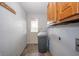 Functional laundry room with cabinetry, shelving and storage at 331 W 5Th St, Lapel, IN 46051