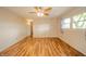 Open living room with natural light, ceiling fan, and neutral decor at 331 W 5Th St, Lapel, IN 46051