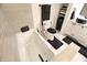 Well-appointed bathroom with a luxurious tub, modern toilet, and stylish black accents at 3401 W Kessler Blvd N Dr, Indianapolis, IN 46222