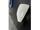 Tesla wall charger with green light on black wall with dart board and trim at 3401 W Kessler Blvd N Dr, Indianapolis, IN 46222