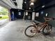 Finished garage includes dart board, painted walls and ceiling, and overhead lighting at 3401 W Kessler Blvd N Dr, Indianapolis, IN 46222