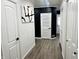 Hallway featuring clean lines, neutral walls, and stylish decor, creating a bright and inviting space at 3401 W Kessler Blvd N Dr, Indianapolis, IN 46222