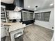 Bright and airy kitchen featuring granite counters, white cabinets, stainless steel appliances and breakfast area at 3401 W Kessler Blvd N Dr, Indianapolis, IN 46222