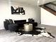 Cozy living room featuring modern decor, a plush sofa, and stylish accents, creating a welcoming atmosphere at 3401 W Kessler Blvd N Dr, Indianapolis, IN 46222