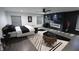 Contemporary main bedroom with a sleek fireplace, modern furniture, and stylish decor at 3401 W Kessler Blvd N Dr, Indianapolis, IN 46222