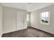 Neutral bedroom offers natural light from two windows and neutral carpeting throughout at 3609 N Keystone Ave, Indianapolis, IN 46218