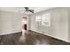 Neutral dining room with ceiling fan, window, and view of a kitchen, perfect for gatherings at 3609 N Keystone Ave, Indianapolis, IN 46218
