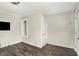 Living room with hardwood floors, white walls, and a window to allow for natural light at 3609 N Keystone Ave, Indianapolis, IN 46218