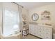 Bright Bedroom features a changing table and decoratively-shelved wall to display books and stuffed animals at 378 Turnberry Ct, Avon, IN 46123