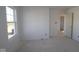Unfinished bedroom with neutral walls and large window at 3942 Seeger St, Indianapolis, IN 46239