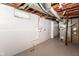 Unfinished basement with painted walls showing pipes and electricals at 4013 Priscilla Ave, Indianapolis, IN 46226