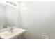 Half bathroom with modern sink and mirror at 4013 Priscilla Ave, Indianapolis, IN 46226