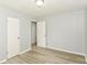 Bedroom with two closets, light walls, and wood flooring at 4013 Priscilla Ave, Indianapolis, IN 46226