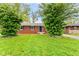 Charming brick home with well-maintained lawn and mature trees at 4013 Priscilla Ave, Indianapolis, IN 46226