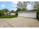 Large detached two car garage with an extra wide concrete driveway at 4013 Priscilla Ave, Indianapolis, IN 46226