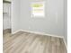 Bright living room featuring modern floors and a fresh, neutral color scheme at 4013 Priscilla Ave, Indianapolis, IN 46226