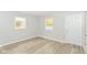 Bright living room with new floors, fresh paint, and natural light at 4013 Priscilla Ave, Indianapolis, IN 46226