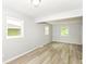 Bright living space with modern flooring, fresh paint, and natural lighting at 4013 Priscilla Ave, Indianapolis, IN 46226