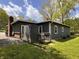 View of a single story home with a back patio and walkway at 406 Frst Pk N Dr, Greenwood, IN 46142