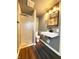 Modern bathroom featuring a glass-enclosed shower, floating vanity, and sleek fixtures at 406 Frst Pk N Dr, Greenwood, IN 46142