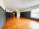 Inviting living room showcasing beautiful hardwood floors and an open floor plan at 406 Frst Pk N Dr, Greenwood, IN 46142