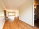 Large living room with wood floors and a brick fireplace at 406 Frst Pk N Dr, Greenwood, IN 46142
