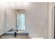 Bathroom featuring a large mirror above the vanity and a black faucet at 4075 Persian St, Greenwood, IN 46143