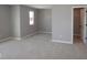 Neutral bedroom featuring plush carpeting, a window, and a walk-in closet for ample storage at 4075 Persian St, Greenwood, IN 46143