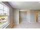 Spacious bedroom with neutral carpet, a window, and access to other rooms at 4075 Persian St, Greenwood, IN 46143