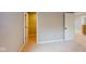 Bedroom with neutral walls and carpet, featuring a walk in closet at 4075 Persian St, Greenwood, IN 46143