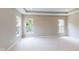 Spacious bedroom features three windows that offer an abundance of natural light, and neutral carpet at 4075 Persian St, Greenwood, IN 46143